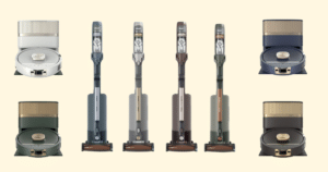 1 | Vacuum Wars Row of Shark vacuum cleaners in various colors on a pale yellow background, including two dock stations at each end and four vertical stick vacuums in the center.